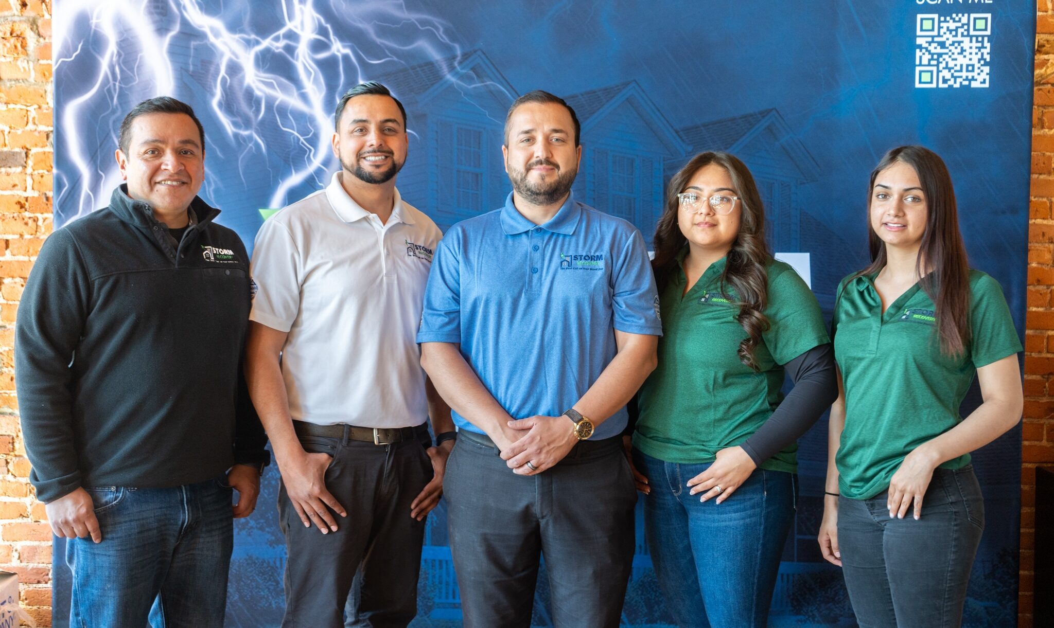 The Storm Recovery team poses together for a photo.